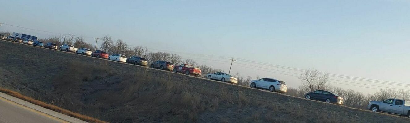 A line of cars quickly backed up on the northbound lanes of Highway 61 as people waited to get a vaccination shot at Ralls County Health Dept’s Clinic last Tuesday.