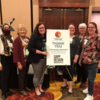 Little Dixie Regional Libraries employees celebrate with Taylor Bequette on her big win. Shown are LDRL Staff Yasmeen El-Jayyousi, Carol Schoonover, Taylor Bequette, Rachael Grime, Sue Mattingly, and Sheryl Morgan.