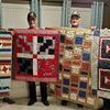 Veterans with their quilts from the Peacemakers Quilt Guild. L-R: Chuck Widaman, Keith Payne, John Booth, &amp; Henry Rousch.